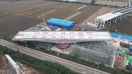 万吨巨桥“华丽转身”!济微高速北段工程上跨瓦日铁路转体桥顺利转体