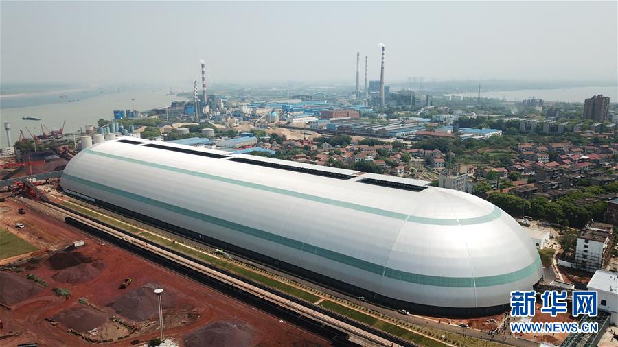 湖南巨型“胶囊”形散货仓库封顶 将于四月底投产
