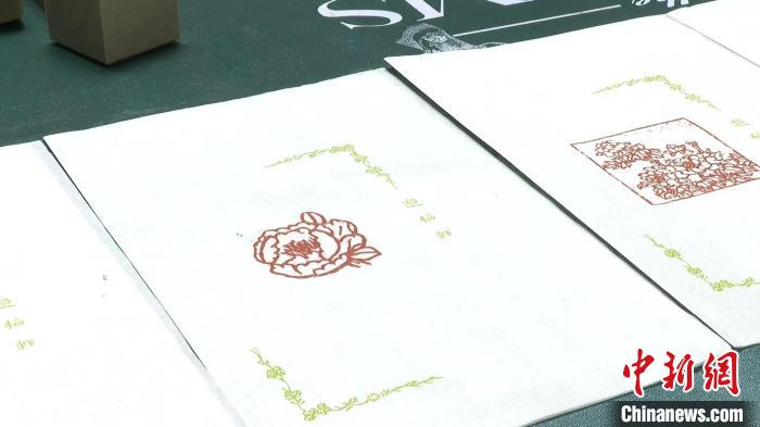 山東匠人創新篆刻藝術 讓菏澤牡丹“花開石上”