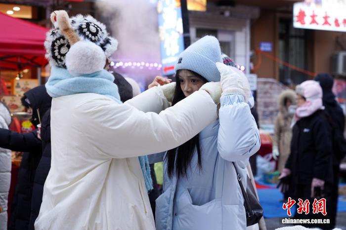 黑龙江哈尔滨:气温走低催生“暖经济” 黑龙江哈尔滨:气温走低催生“暖经济”