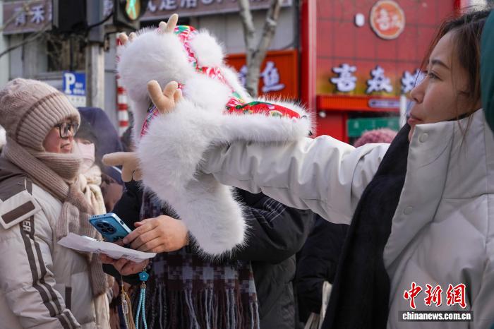 黑龙江哈尔滨:气温走低催生“暖经济”