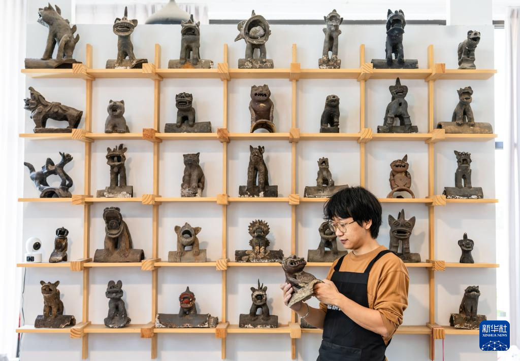 图片故事丨90后青年匠人 让镇宅神兽从屋顶走入“心房”